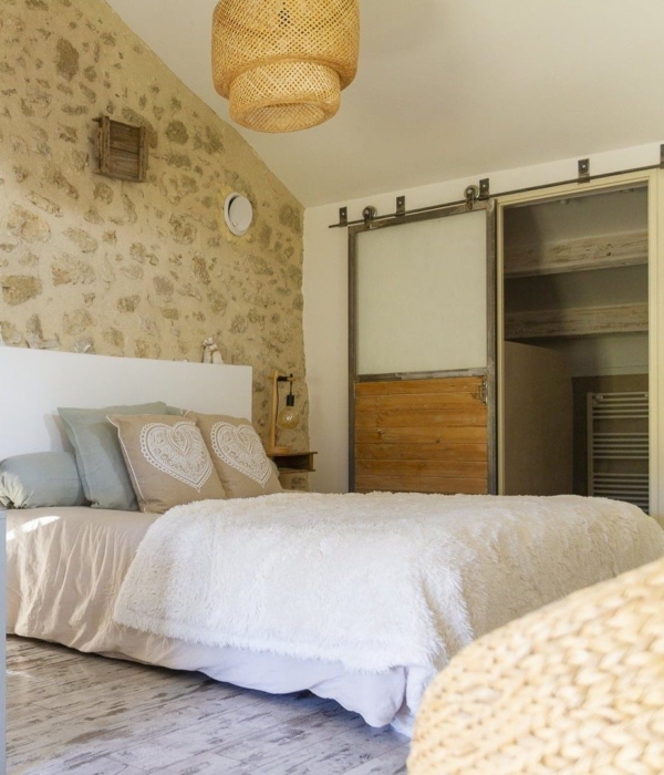 a room with a bed and a table