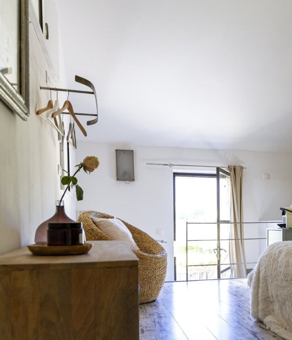 a room with a bed and a window