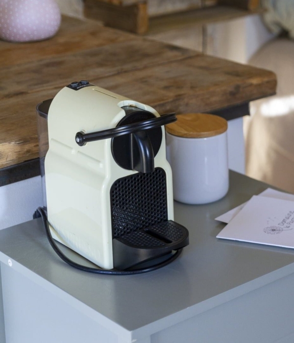 a coffee pot sitting on a table