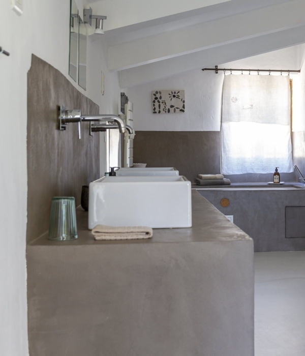a kitchen with sink and stove