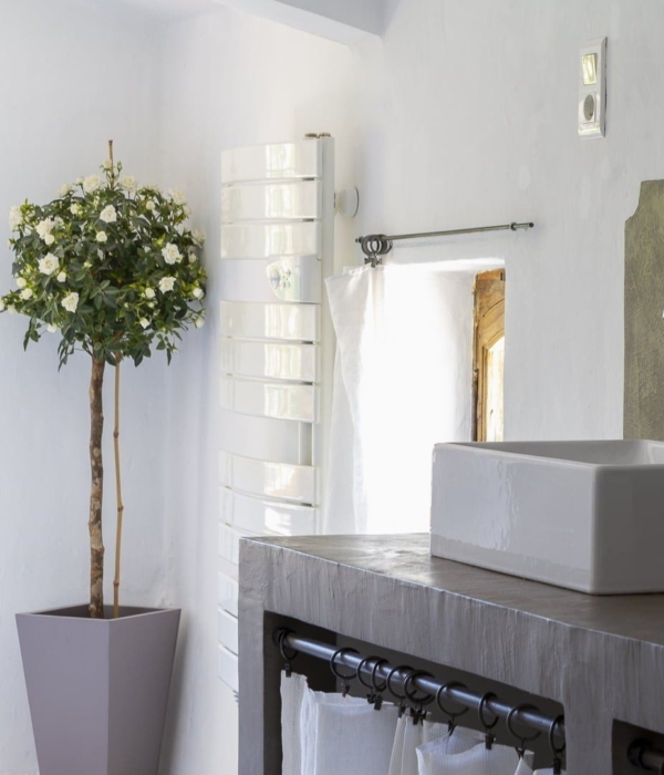 a bathroom with sink and mirror