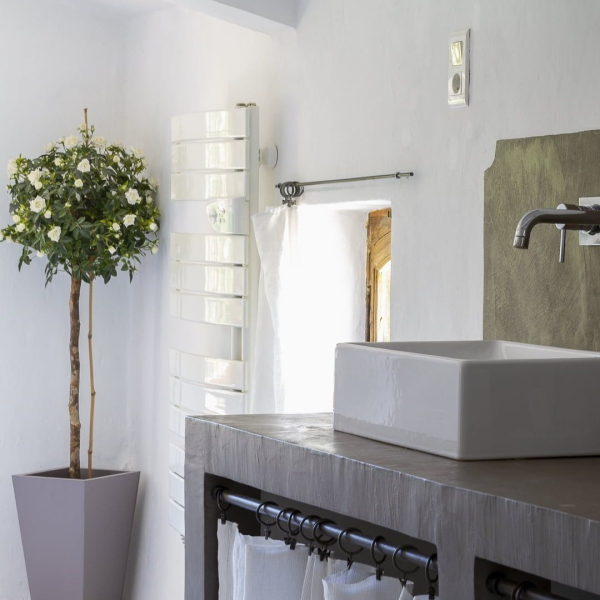 a bathroom with sink and mirror