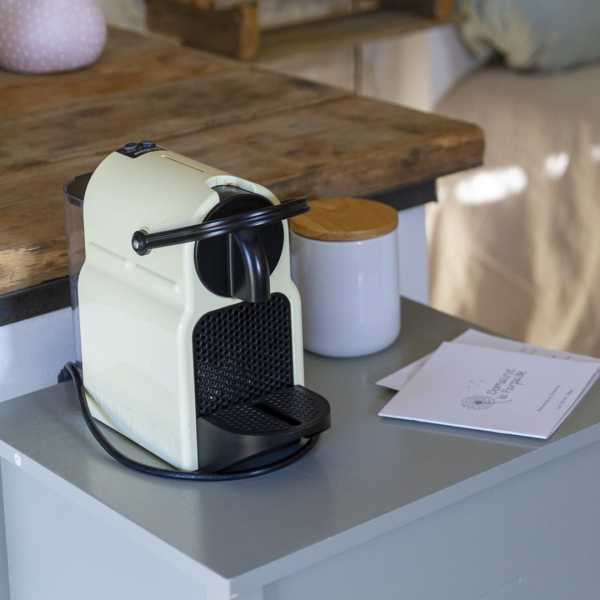 a coffee pot sitting on a table